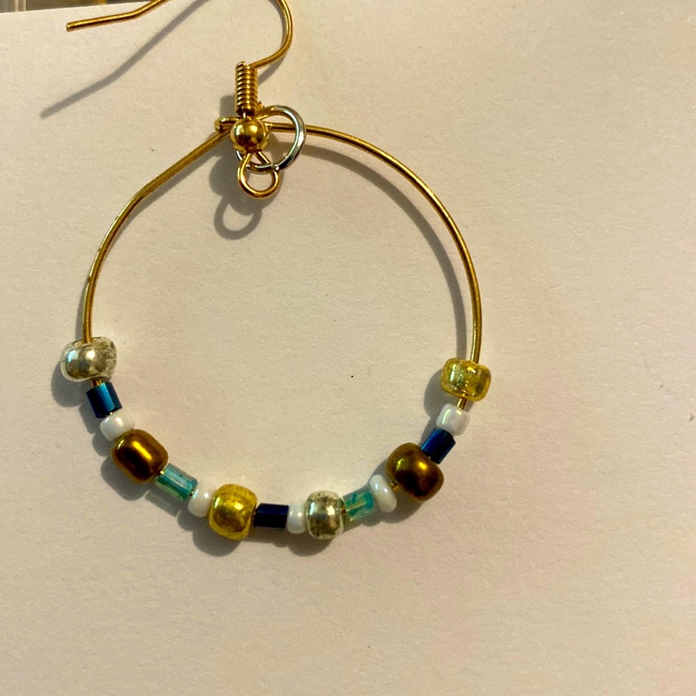 Made with lots of love this very special earring has many beautiful colors!